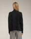 Jersey oversize de punto con cuello perkins y detalles de cuadros