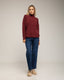 Jersey oversize de punto con cuello perkins y detalles de cuadros