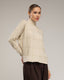 Jersey oversize de punto con cuello perkins y detalles de cuadros