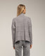 Jersey oversize de punto con cuello perkins y detalles de cuadros