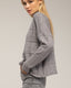 Jersey oversize de punto con cuello perkins y detalles de cuadros