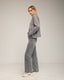 Jersey oversize de punto con cuello perkins y detalles de cuadros