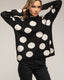 Jersey amplio de lunares con cuello alto