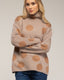Jersey amplio de lunares con cuello alto