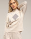 Jersey de punto con rombo y detalles de strass y cuello perkins
