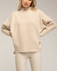 Jersey oversize con textura de rayas y cuadros.