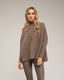 Jersey oversize con textura de rayas y cuadros.