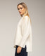 Jersey oversize con textura de rayas y cuadros.