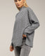Jersey oversize con textura de rayas y cuadros.