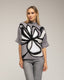 Jersey de punto estampado de flores con lentejuelas y manga francesa.