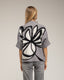 Jersey de punto estampado de flores con lentejuelas y manga francesa.