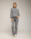Sudadera efecto desgastado con detallles de strass.