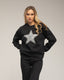 Sudadera con dibujo de estrella con lentejuelas y textura.