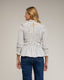 Blusa de manga larga de rayas con nido de abeja en el pecho y puños, volante en la parte inferior. - Tantra Spain