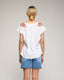 Camiseta con cuello pico y lentejuelas y abalorios en los hombros. - Tantra Spain