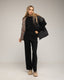 Chaleco acolchado oversize reversible con capucha y bolsillos de cremallera. - Tantra Spain