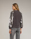 Jersey de punto con mangas de lentejuelas. - Tantra Spain