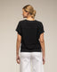 Jersey de punto con textura , cuello pico y manga corta - Tantra Spain
