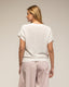 Jersey de punto con textura , cuello pico y manga corta - Tantra Spain