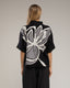 Jersey de punto estampado de flores con lentejuelas y manga francesa. - Tantra Spain