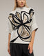 Jersey de punto estampado de flores con lentejuelas y manga francesa. - Tantra Spain