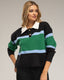 Jersey de punto tipo polo con franjas horizontales y botones dorados. - Tantra Spain