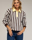 Jersey de punto tipo polo con rayas verticales y botones dorados. - Tantra Spain