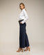 Pantalon ancho tipo flare con bolsillos laterales y en la parte posterior - Tantra Spain