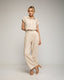 Pantalon recto con bolsillos laterales y cintura fruncida. - Tantra Spain