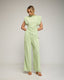 Set de pantalon recto con pinzas y bolsillos laterales. Top de manga corta con hombreras, frunce lateral y largo asimetrico. - Tantra Spain