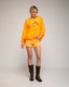 Short denim en color fluor y desflecado en el bajo. - Tantra Spain