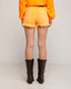 Short denim en color fluor y desflecado en el bajo. - Tantra Spain