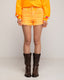 Short denim en color fluor y desflecado en el bajo. - Tantra Spain