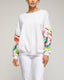 Sudadera con bordados en las mangas. - Tantra Spain