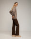 Sudadera efecto desgastado con detallles de strass. - Tantra Spain