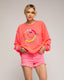 Sudadera fluor con dibujo "smile" y bordados en el frente y puños. - Tantra Spain
