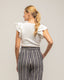 Top de punto ajustado con volantes en las mangas. - Tantra Spain