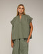 Top oversize de manga corta con pliegues en los hombro. - Tantra Spain