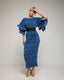Vestido maxi estampado plisado con volantes en las mangas y cinturón. - Tantra Spain