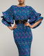 Vestido maxi estampado plisado con volantes en las mangas y cinturón. - Tantra Spain