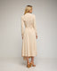 Vestido midi de manga larga con frunce lateral y falda asimetrica con vuelo. Detalle de botones en el hombro. - Tantra Spain
