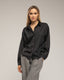 Blusa con seda con botones de piedras