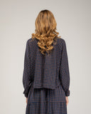 Blusa de cuadros con lazo, cuello y puños elásticos