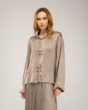Blusa tipo chaqueta con cierre japones con seda