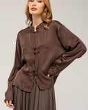 Blusa tipo chaqueta con cierre japones con seda
