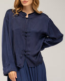 Blusa tipo chaqueta con cierre japones con seda
