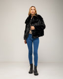 Short faux fur coat with lapel and side pockets