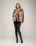 Short faux fur coat in multiple shades, with lapels and side pockets