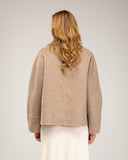 Double-breasted wool overcoat with side pockets and lapel collar