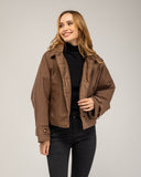 Chaqueta corta oversize, reversible,  impermeable y con capucha desmontable